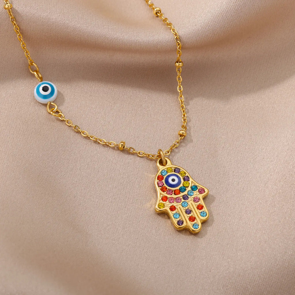 Necklace with multicolor Arabic evil eye and Hamsa protection pendant in gold