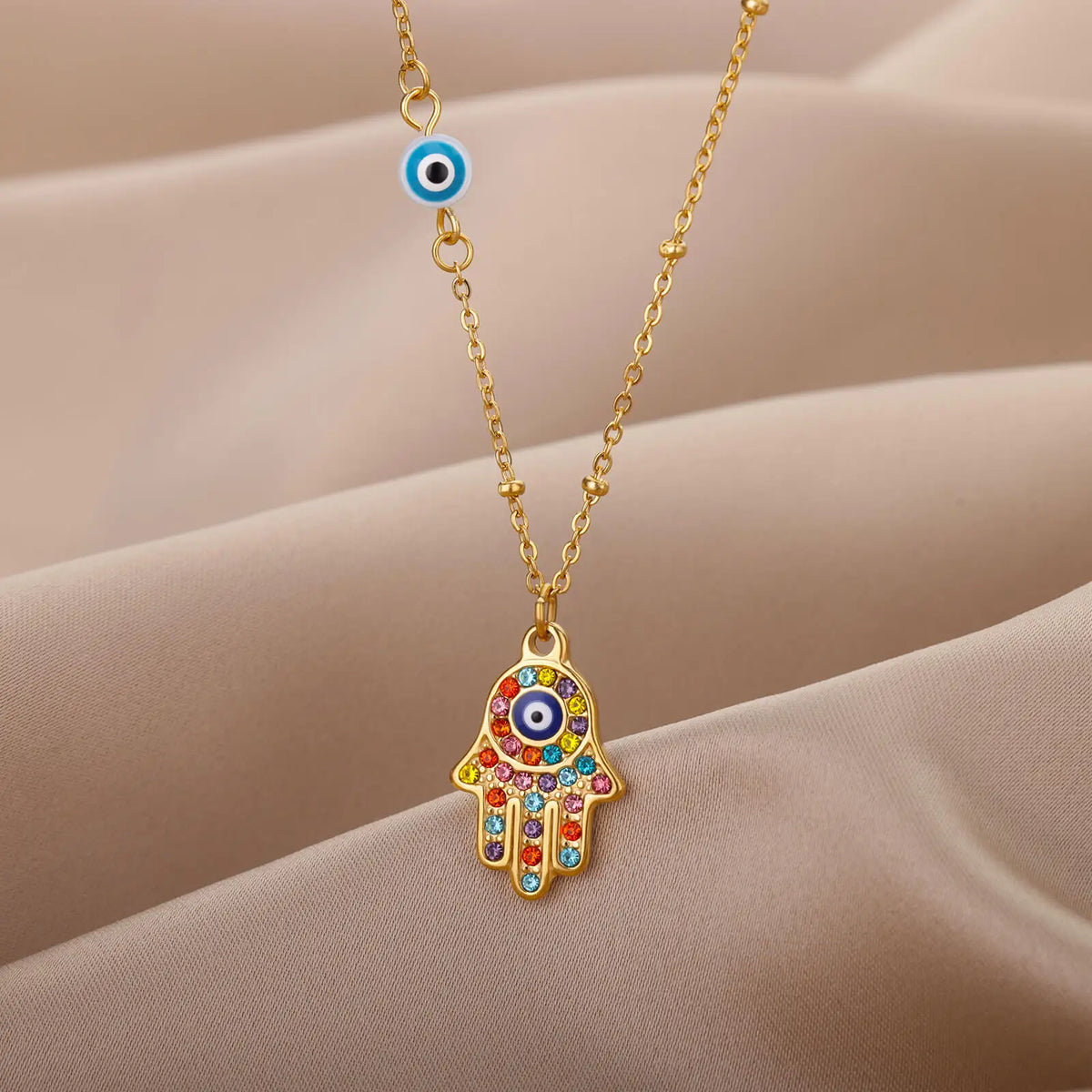 Necklace with multicolor Arabic evil eye and Hamsa protection pendant in gold