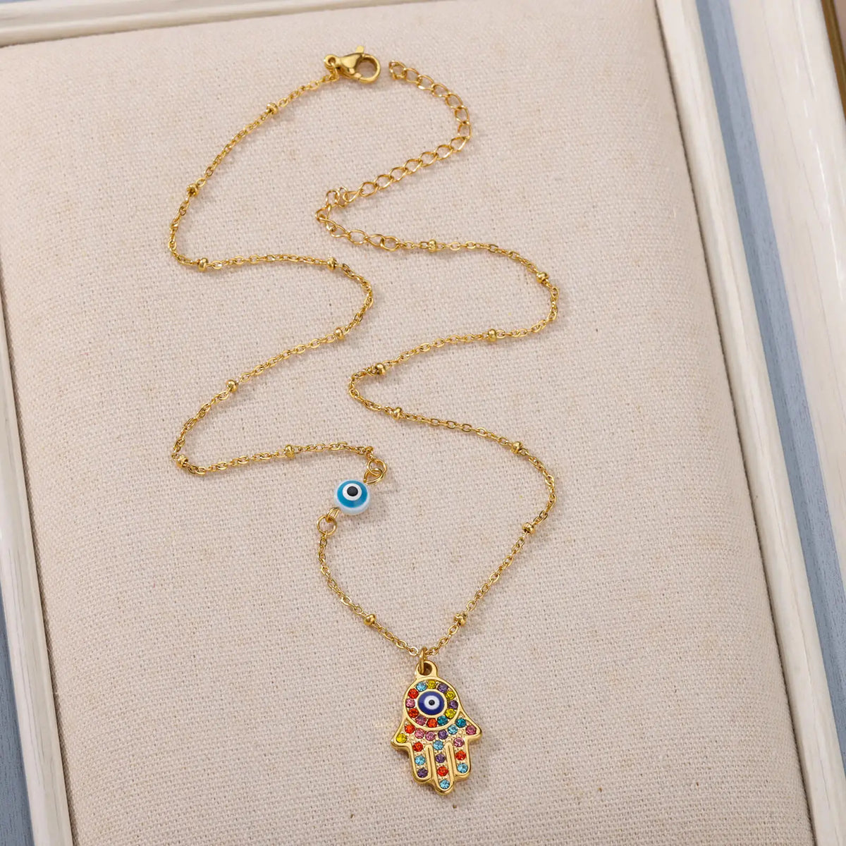 Necklace with multicolor Arabic evil eye and Hamsa protection pendant