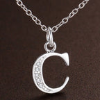 Long necklace with initial pendant c