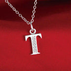 Long necklace with initial pendant t