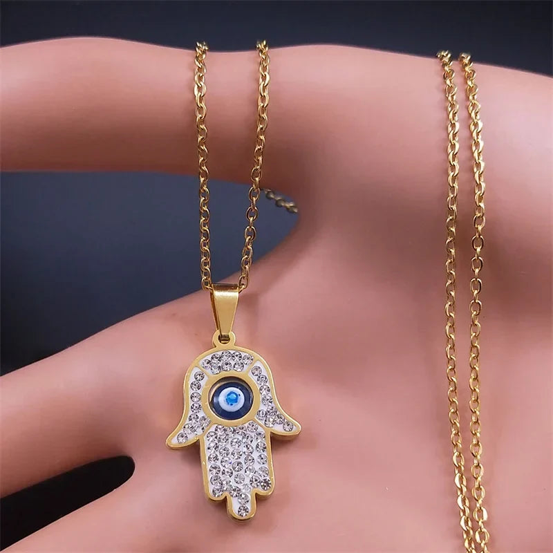 Long necklace with evil eye protection pendant and Arabic Hamsa hand in gold