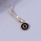 Necklace with colorful initial pendant o