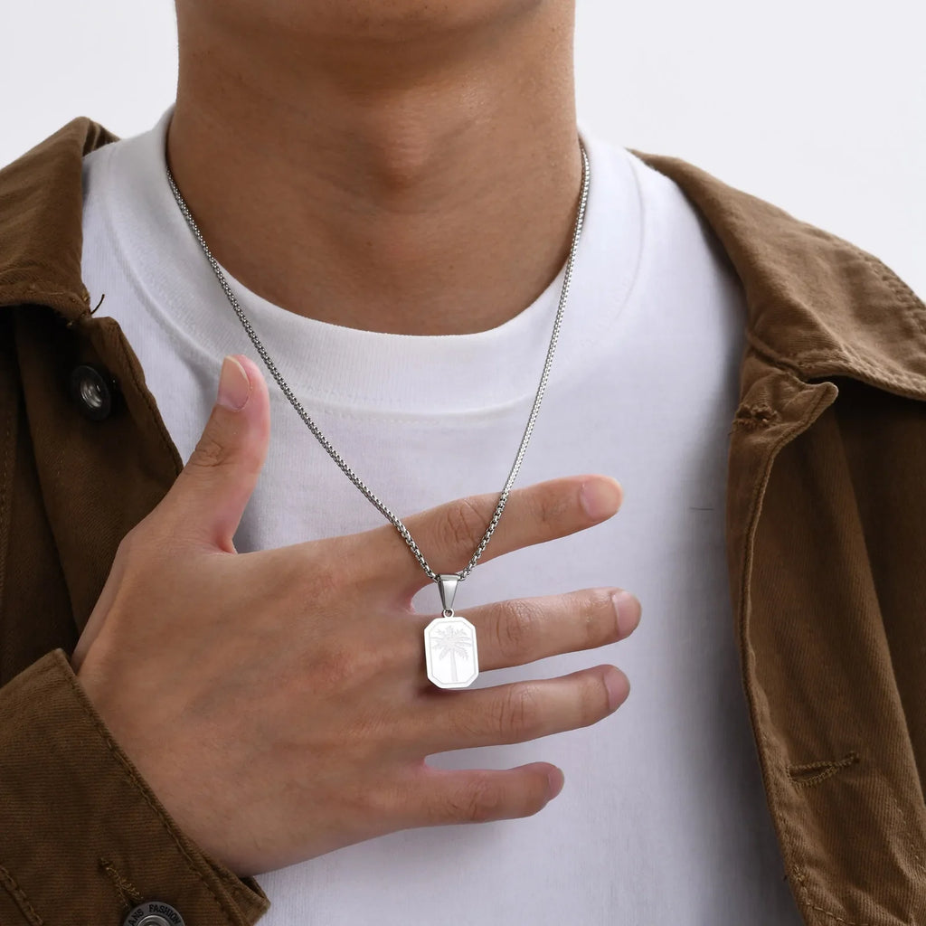 Geometric palm pendant necklace in silver