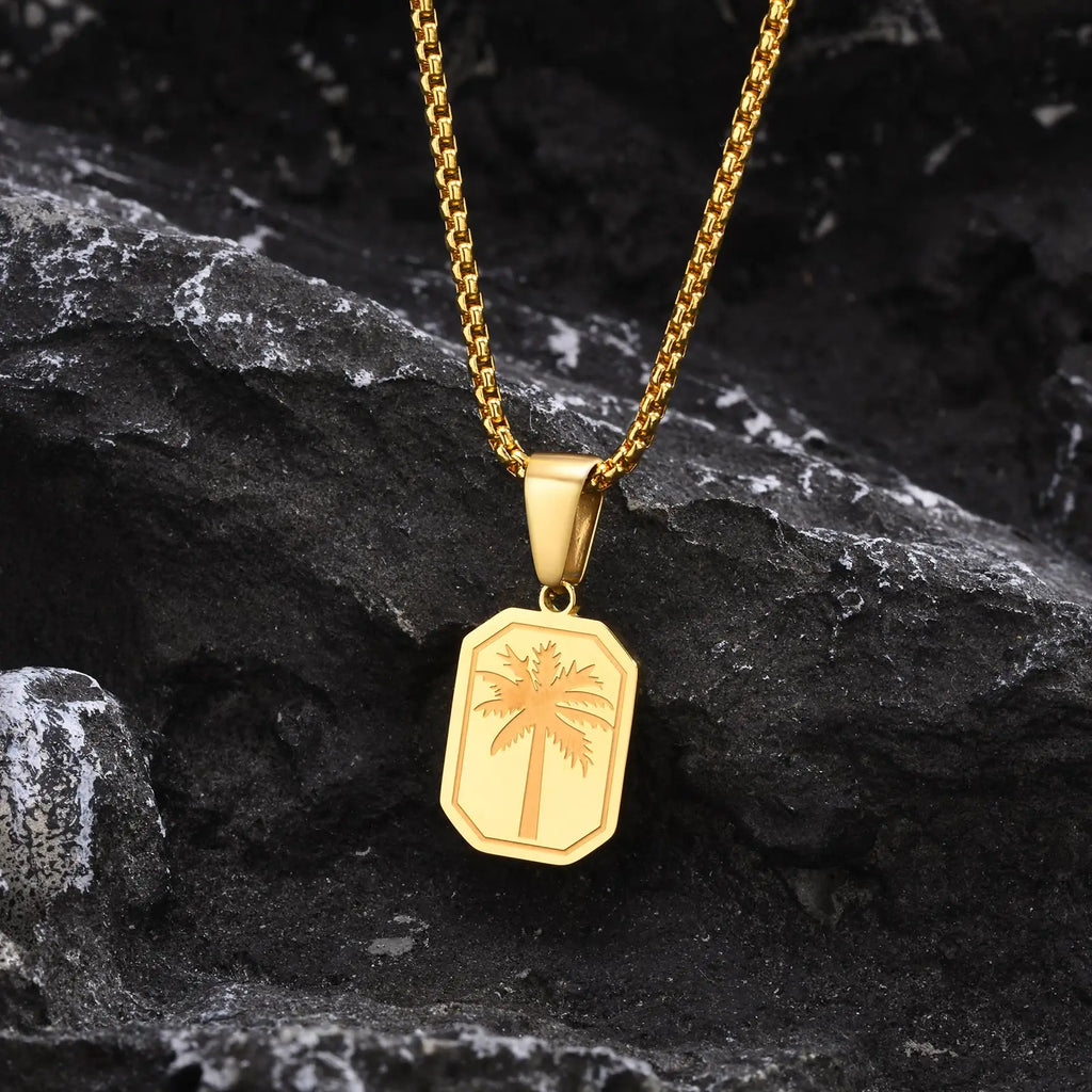Geometric palm pendant necklace in gold