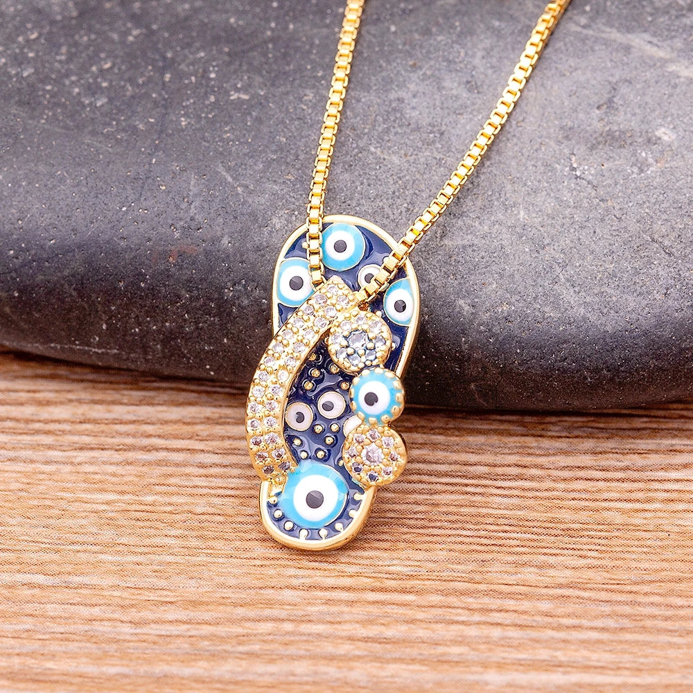 Necklace with Tongue Pendant Blue Eye and Zircon