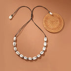 White and black cowrie shell necklace
