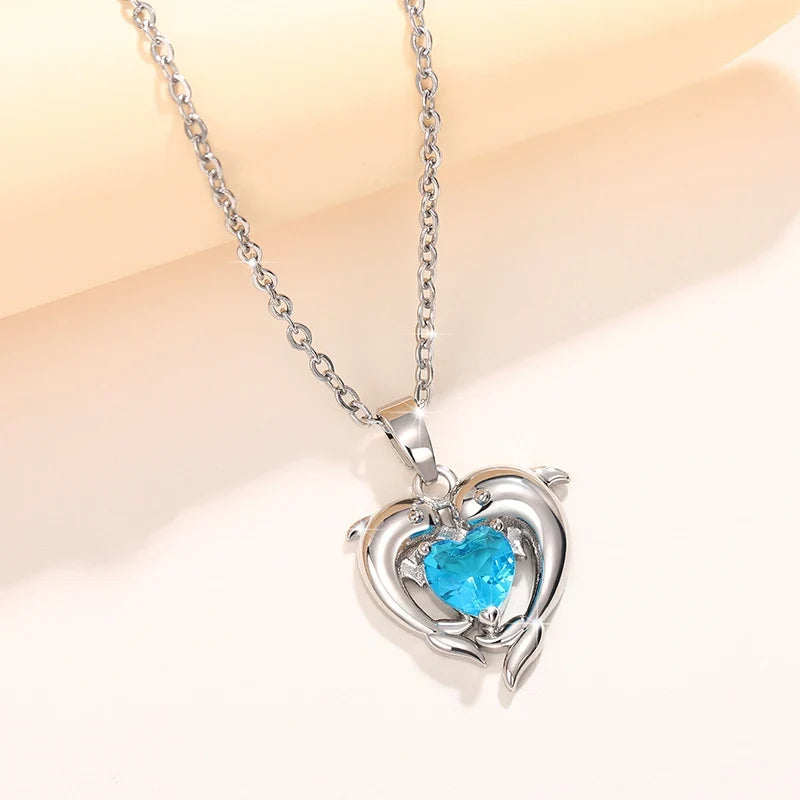 Timeless necklace with double dolphin