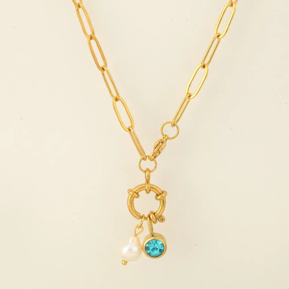 Chain necklace with pearl pendant and December birthstone