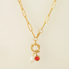 Chain necklace with pearl pendant and January birthstone