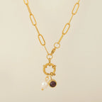 Chain necklace with pearl pendant and May birthstone