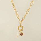 Chain necklace with pearl pendant and October birthstone