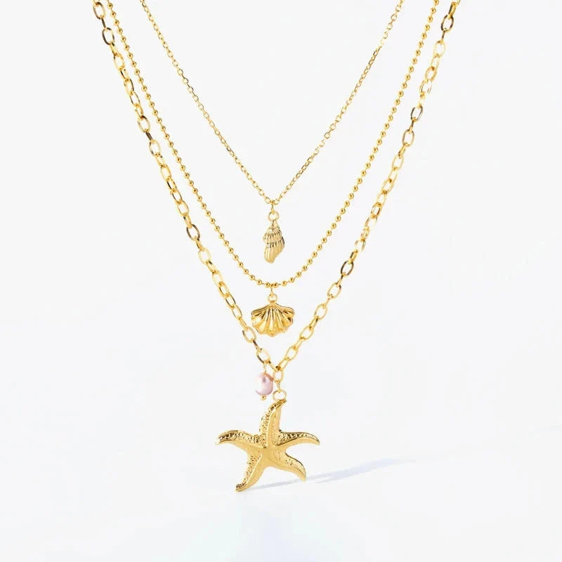 Multi-Strand Necklace with Shell Pendant, Starfish, Conch, and Scallop Shell