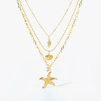 Multi-Strand Necklace with Shell Pendant, Starfish, Conch, and Scallop Shell