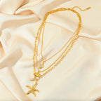 Multi-Strand Necklace with Shell Pendant, Starfish, Conch, and Scallop Shell