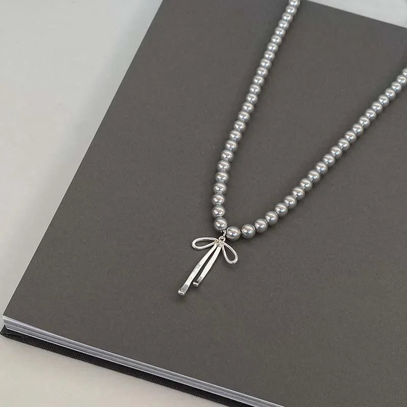 Necklace with Gray Bead Pendant and Bow Knot 