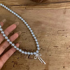 Necklace with Gray Bead Pendant and Bow Knot 