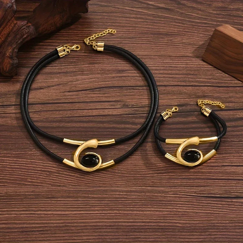 Geometric Pendant Necklace and Bracelet in Gold