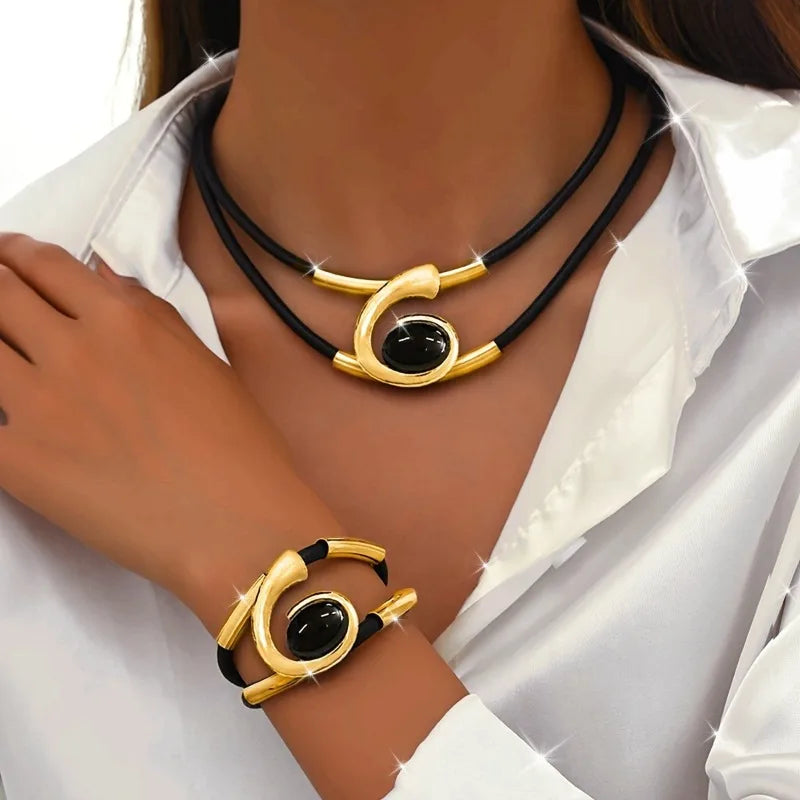 Geometric Pendant Necklace and Bracelet in Gold