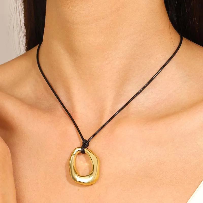 Hollow Water Drop Pendant Necklace Black Cord and Gold