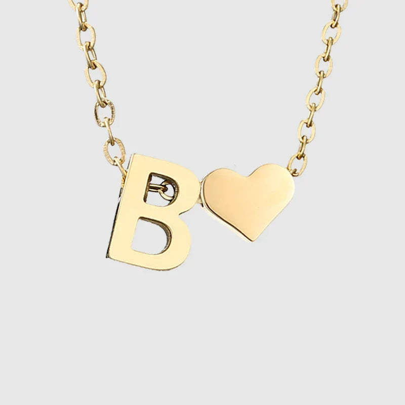 Women's necklace with heart pendant and initial - letter