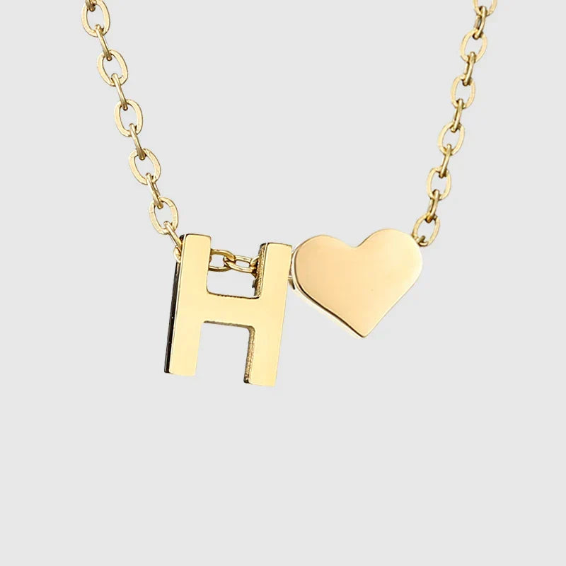 Women's necklace with heart pendant and initial - letter