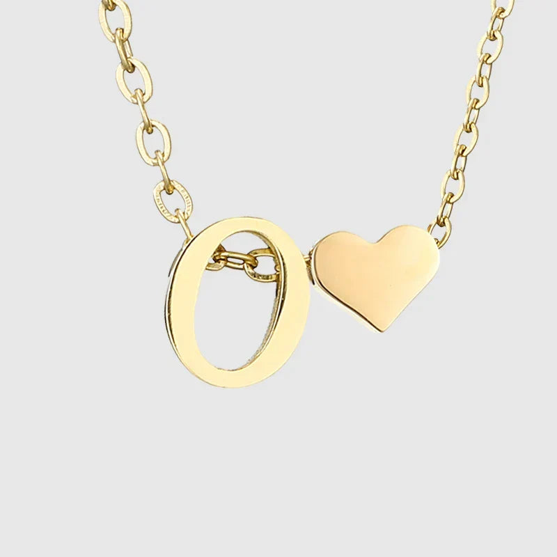Women's necklace with heart pendant and initial - letter