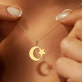 Women's necklace with symbolic Islamic crescent and star pendant in gold-tone Arabic style