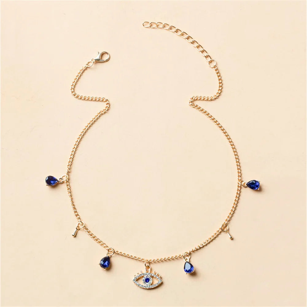 Choker Necklace with Blue Turkish Evil Eye Pendant, Rhinestones and Pearls in gold