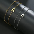 Double Initial Bracelet in Gold and Silver a