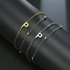 Double Initial Bracelet in Gold and Silver  p