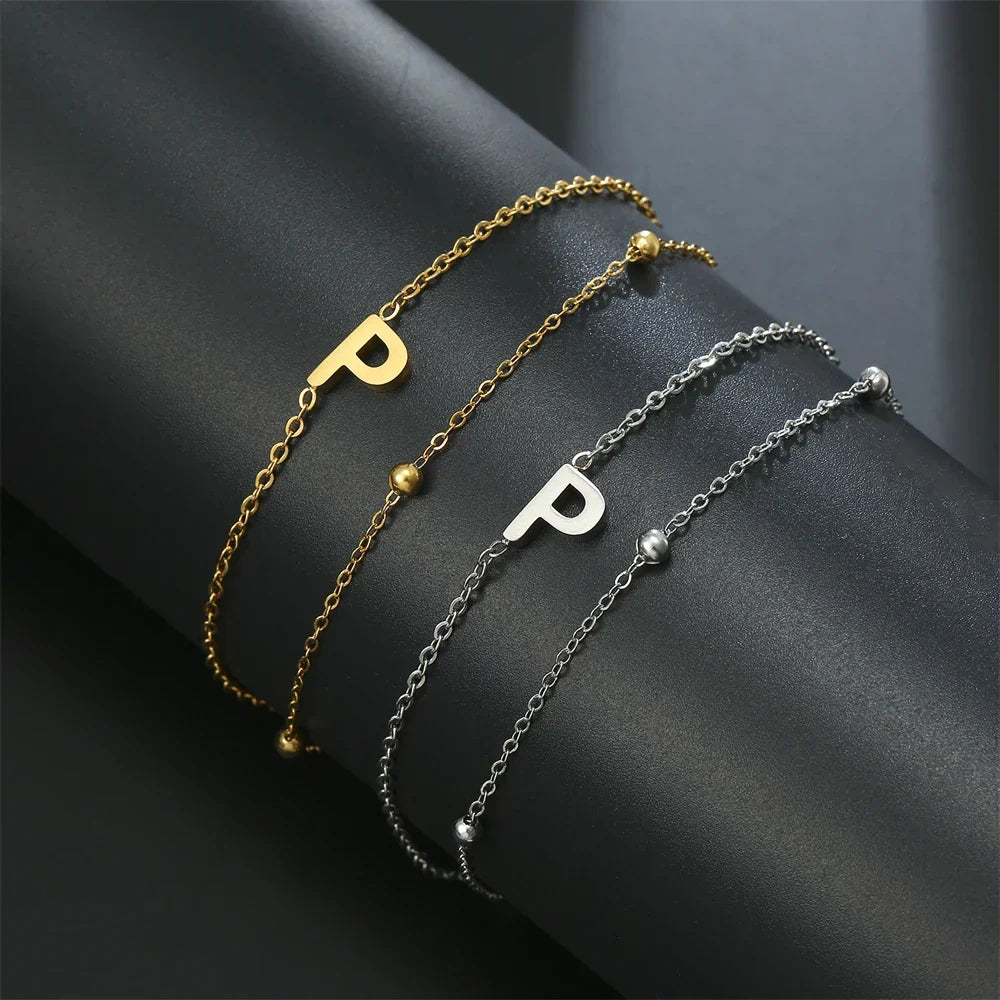 Double Initial Bracelet in Gold and Silver  p