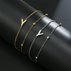 Double Initial Bracelet in Gold and Silver  y