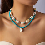 Double cowrie shell necklace, turquoise