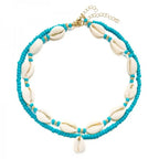 Double cowrie shell necklace, turquoise