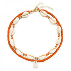 Double cowrie shell necklace, red