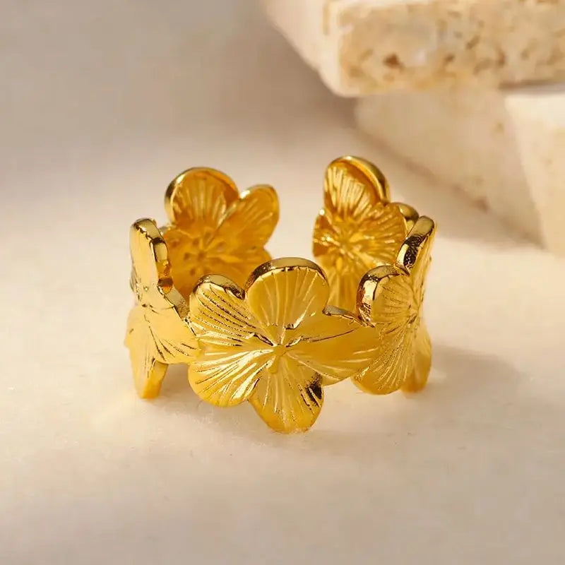 Large Ring with Five-Petal Gold-Tone Flowers