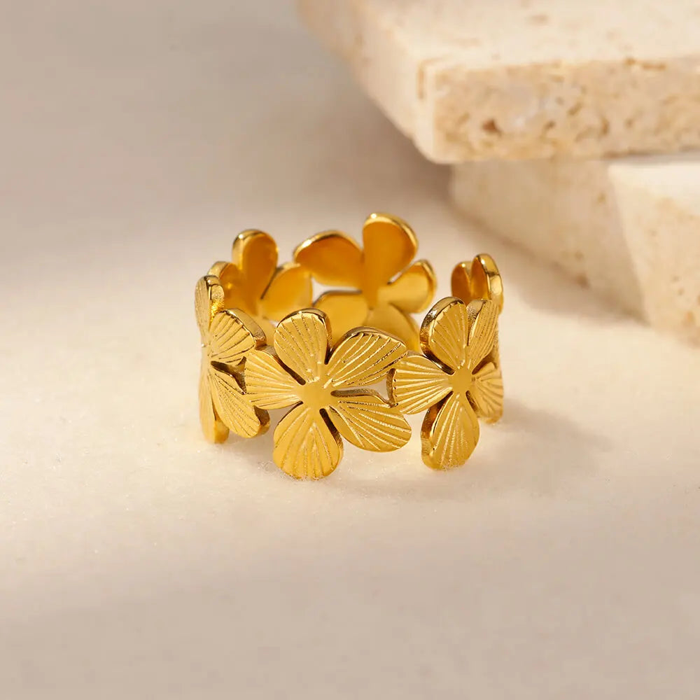 Large Ring with Five-Petal Gold-Tone Flowers
