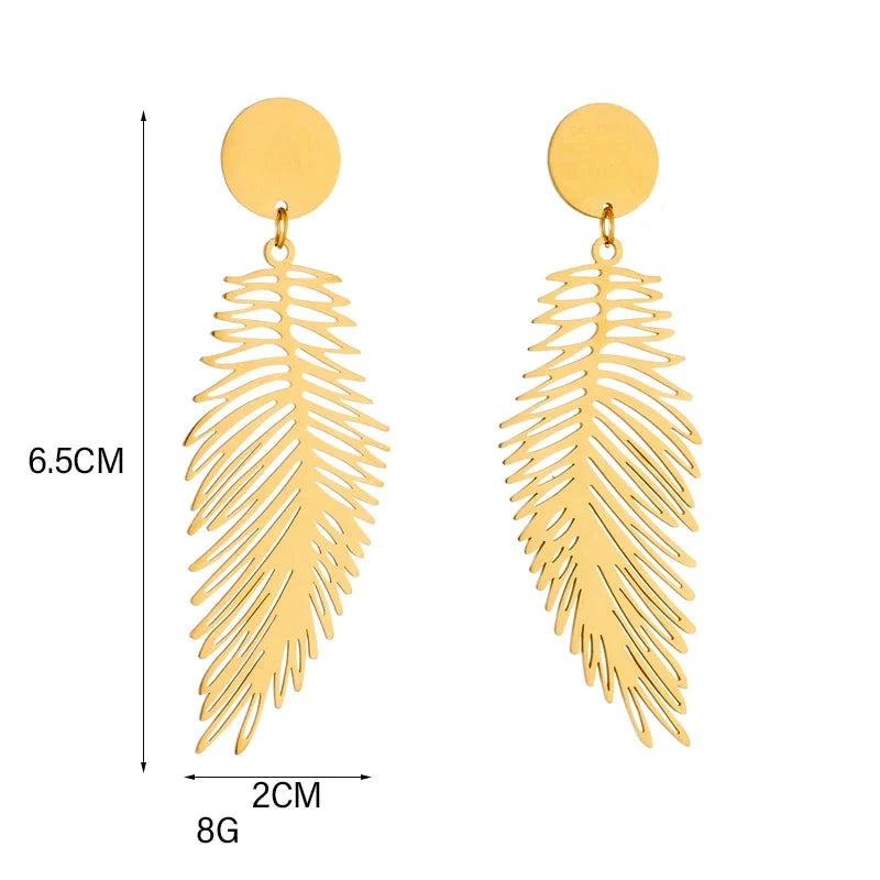 Large stylized feather earrings