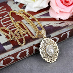 Long necklace with traditional Arabic white gold-tone pendant