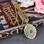 Long necklace with traditional Arabic green gold-tone pendant