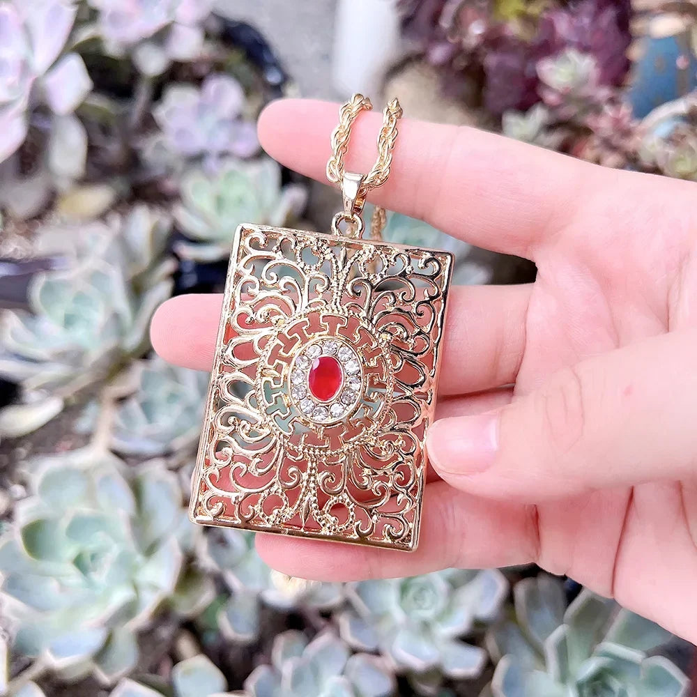 Long necklace with traditional Arabic red pendant