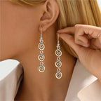 Long spiral drop earrings