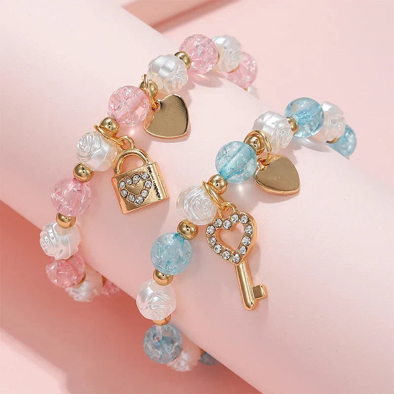 Set of 2 key and padlock bracelets