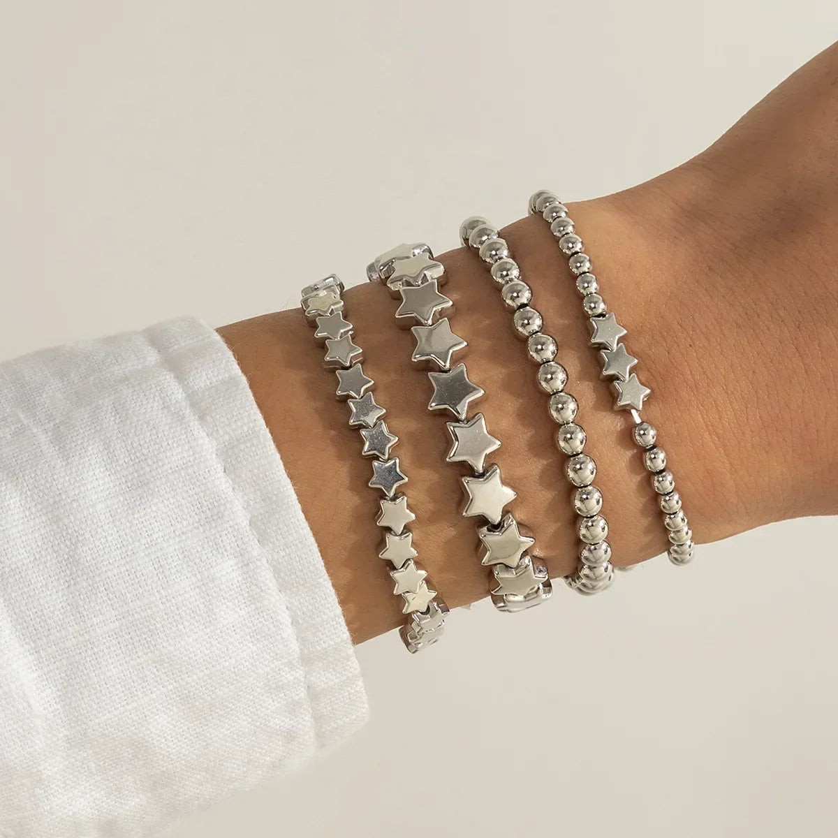 Set of 4 Star Bracelets in silver